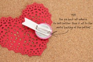 Tip for adhering pin back to the button