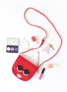 Use your Cricut Explore to create knockoffs of those designer goods. The possibilities are endless with this machine! Create this DIY Designer Crossbody , Tory Burch inspired bag with just a few leather embellishments.