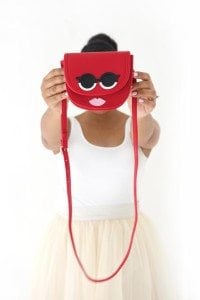 Use your Cricut Explore to create knockoffs of those designer goods. The possibilities are endless with this machine! Create this DIY Designer Crossbody , Tory Burch inspired bag with just a few leather embellishments.