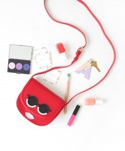 Use your Cricut Explore to create knockoffs of those designer goods. The possibilities are endless with this machine! Create this DIY Designer Crossbody , Tory Burch inspired bag with just a few leather embellishments.