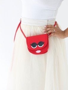 Use your Cricut Explore to create knockoffs of those designer goods. The possibilities are endless with this machine! Create this DIY Designer Crossbody , Tory Burch inspired bag with just a few leather embellishments.