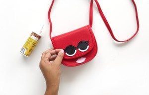 Use your Cricut Explore to create knockoffs of those designer goods. The possibilities are endless with this machine! Create this DIY Designer Crossbody , Tory Burch inspired bag with just a few leather embellishments.