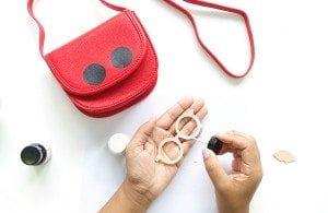 Use your Cricut Explore to create knockoffs of those designer goods. The possibilities are endless with this machine! Create this DIY Designer Crossbody , Tory Burch inspired bag with just a few leather embellishments.