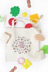 Use a few supplies to create a customized diy stamped canvas tote bag that you can color with fabric markers
