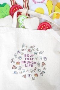 Use a few supplies to create a customized diy stamped canvas tote bag that you can color with fabric markers