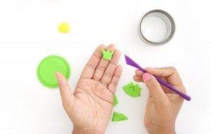 Create DIY Fruity Wooden Bracelet Trinket Boxes with a wooden bracelet and clay to create the perfect desk accessory