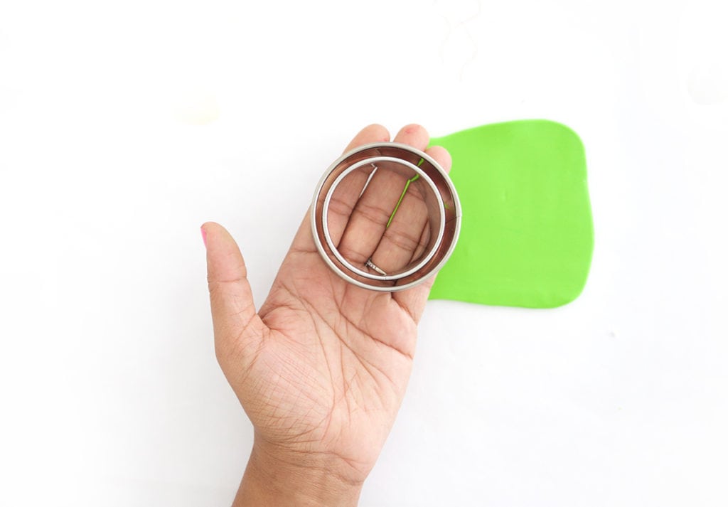 Create DIY Fruity Wooden Bracelet Trinket Boxes with a wooden bracelet and clay to create the perfect desk accessory