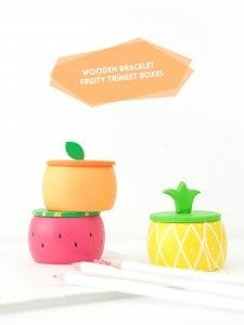 Create DIY Fruity Wooden Bracelet Trinket Boxes with a wooden bracelet and clay to create the perfect desk accessory