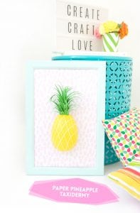 Mimic the look of taxidermy with a paper mache egg and some paint. This 3D diy paper mache pineapple wall art is a show stopper and a perfect addition to your gallery wall.