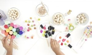 Grab some paint and learn how to paint wooden beads in a variety of different patterns..