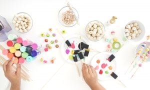 Grab some paint and learn how to paint wooden beads in a variety of different patterns..