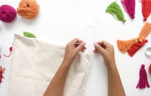 Creating a tassel tote bag has never been easier or more stylish. Usher in the summer with this tote that will turn heads.