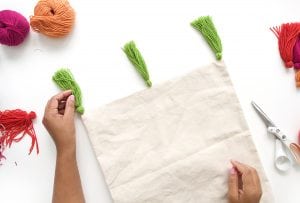 Creating a tassel tote bag has never been easier or more stylish. Usher in the summer with this tote that will turn heads.