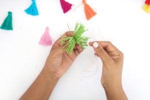 Use embroidery floss to create bold DIY tiered tassels for your beach tote.