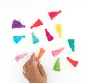 Use embroidery floss to create bold DIY tiered tassels for your beach tote.