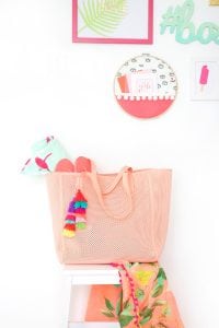 Use embroidery floss to create bold DIY tiered tassels for your beach tote.