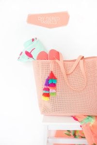 Use embroidery floss to create bold DIY tiered tassels for your beach tote.