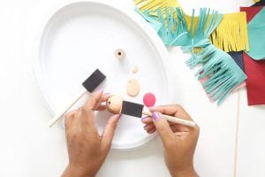 Tassels will never go out of style so why not create these leather and wood bead tassels in just a few steps.Your tote bag will thank you.