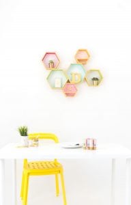 Create these DecoArt Metallic Hexagon Wall Shelves using DecoArt gold metallic paints to add perfect shimmer to your office walls.