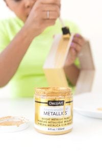Create these DecoArt Metallic Hexagon Wall Shelves using DecoArt gold metallic paints to add perfect shimmer to your office walls.