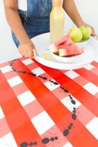 Learn how to paint gingham onto your table top and create the perfect place for hosting indoor picnics year round!