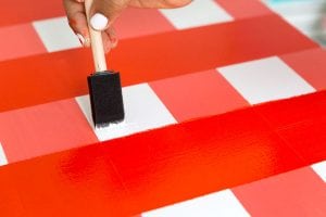 Learn how to paint gingham onto your table top and create the perfect place for hosting indoor picnics year round!
