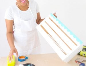 Enjoy the outdoors with this DIY Wooden Crate Picnic Basket that is easy to create with paint and simple tools. Great for enjoying the end of summer.