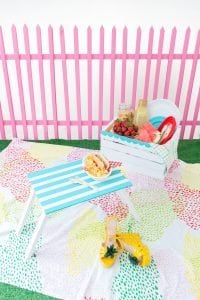 Enjoy the outdoors with this DIY Wooden Crate Picnic Basket that is easy to create with paint and simple tools. Great for enjoying the end of summer.