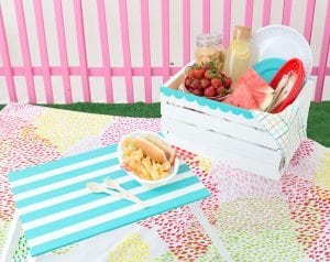 Enjoy the outdoors with this DIY Wooden Crate Picnic Basket that is easy to create with paint and simple tools. Great for enjoying the end of summer.