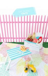Enjoy the outdoors with this DIY Wooden Crate Picnic Basket that is easy to create with paint and simple tools. Great for enjoying the end of summer.