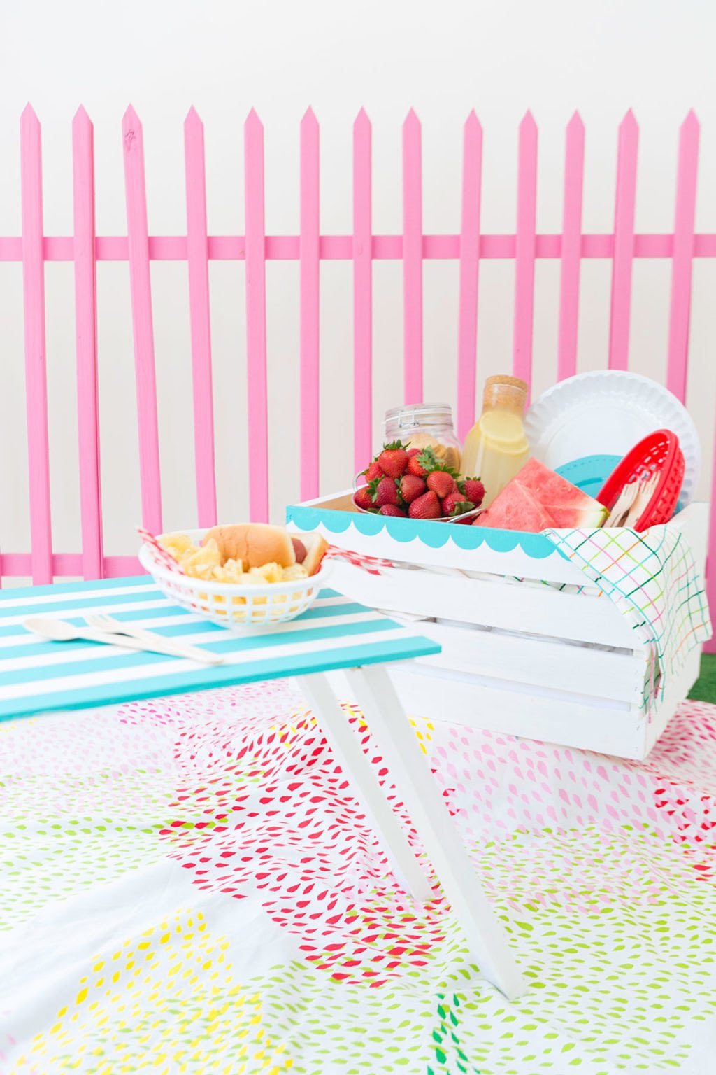 Enjoy the outdoors with this DIY Wooden Crate Picnic Basket that is easy to create with paint and simple tools. Great for enjoying the end of summer. 