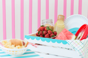Enjoy the outdoors with this DIY Wooden Crate Picnic Basket that is easy to create with paint and simple tools. Great for enjoying the end of summer.