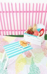 Enjoy the outdoors with this DIY Wooden Crate Picnic Basket that is easy to create with paint and simple tools. Great for enjoying the end of summer.