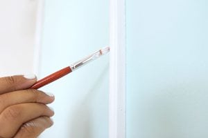 The DIY Stylish Painted Doors with Moulding are a simple and affordable way to upgrade a plain door into something impressive.