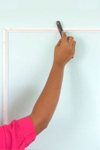 The DIY Stylish Painted Doors with Moulding are a simple and affordable way to upgrade a plain door into something impressive.