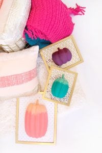 celebrate fall with bold colors and these easy DIY paper pumpkin wall art pieces. All you need is paint!