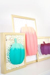 celebrate fall with bold colors and these easy DIY paper pumpkin wall art pieces. All you need is paint!