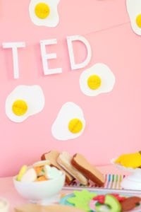 Learn how to make a Fried Egg Easter Brunch Backdrop and add some whimsy to your holiday festivities