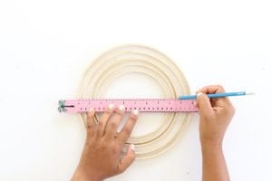 Learn how to make a wooden waldorf rainbow like the ones you see in toy boutiques. You won't believe how easy these are!